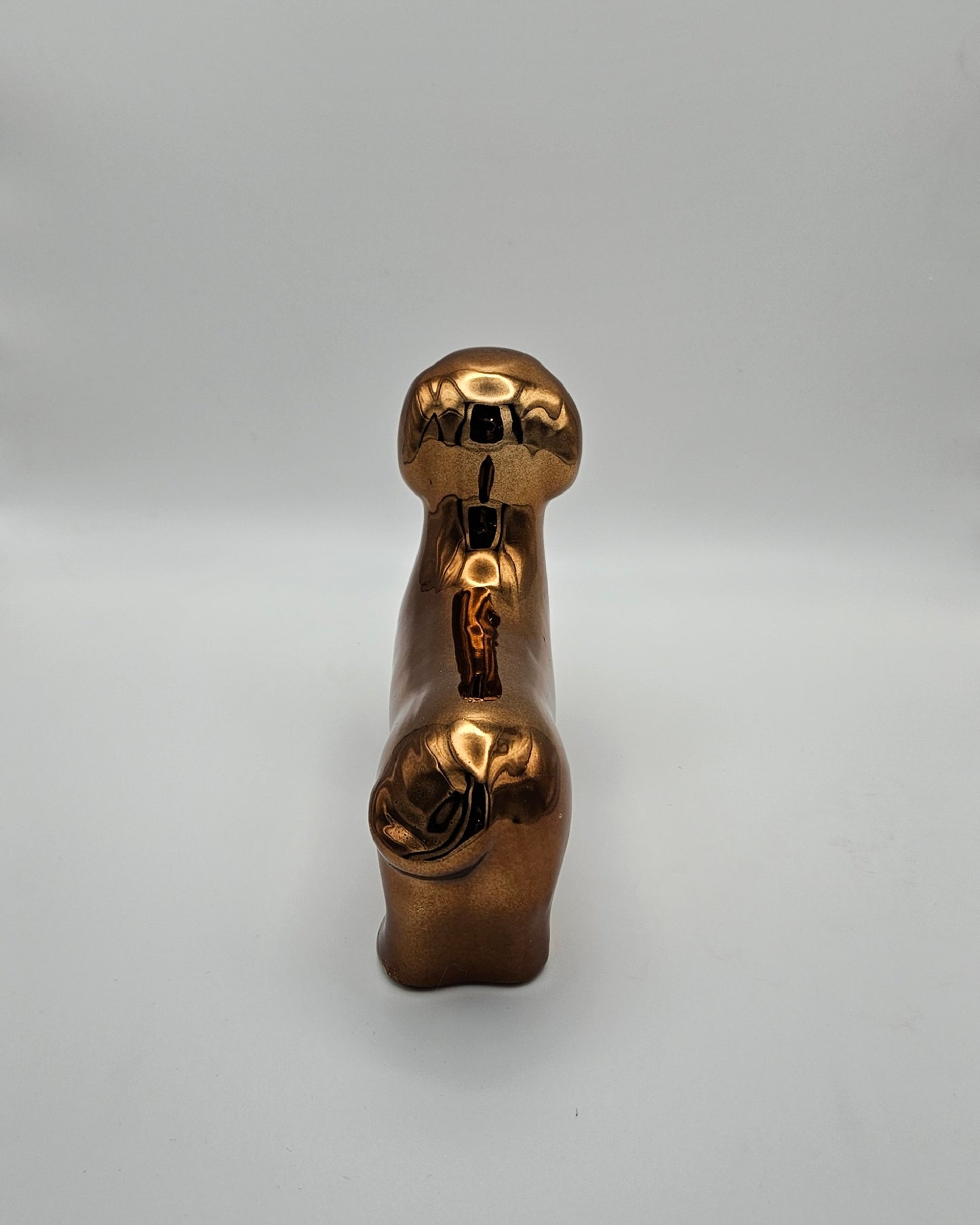 Kleiner bronzener Deko-Dackel – glänzendes Deko-Highlight aus Keramik