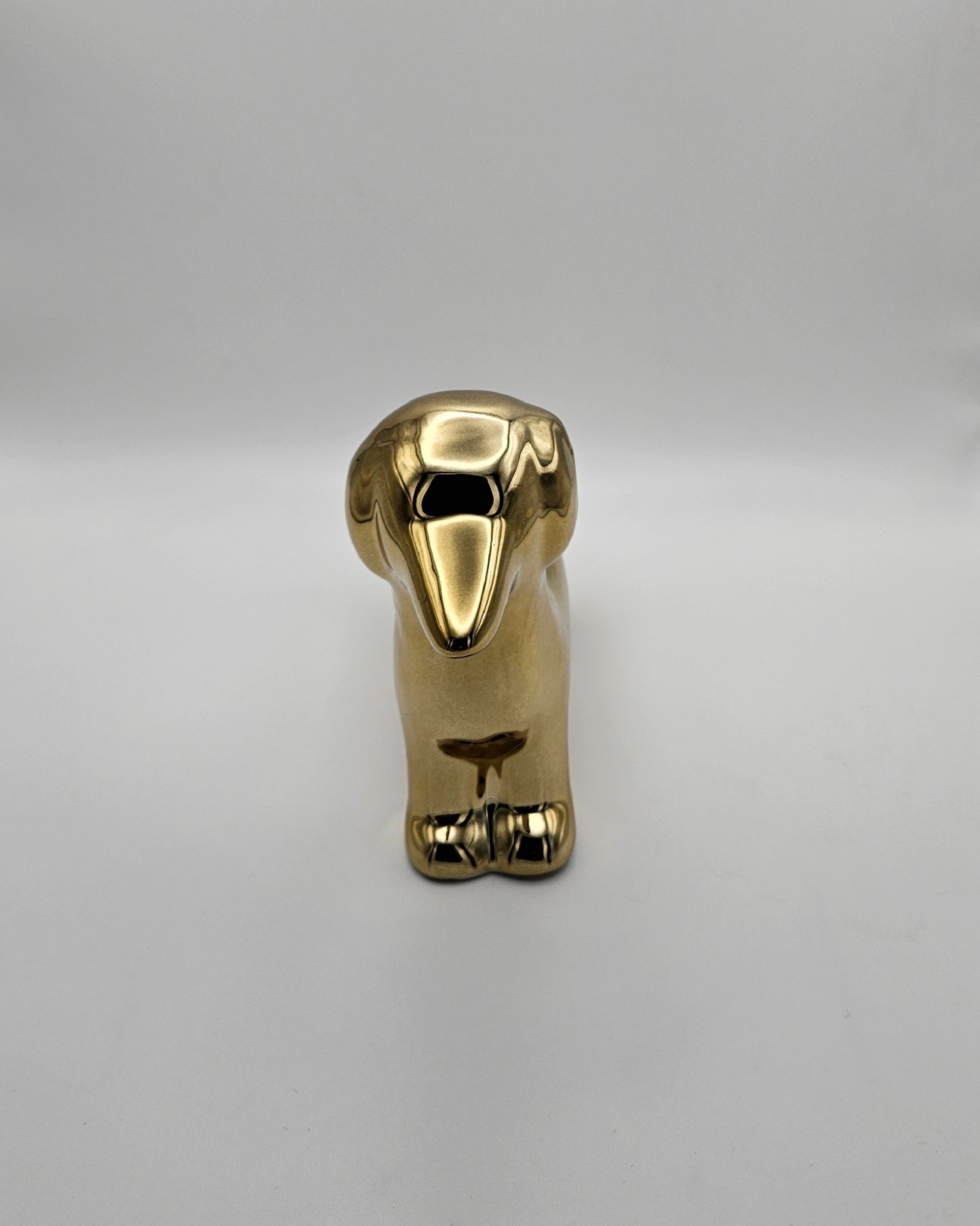 Kleiner goldener Deko-Dackel – glänzendes Deko-Highlight aus Keramik