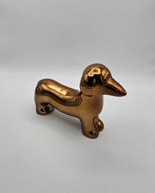 Kleiner bronzener Deko-Dackel – glänzendes Deko-Highlight aus Keramik